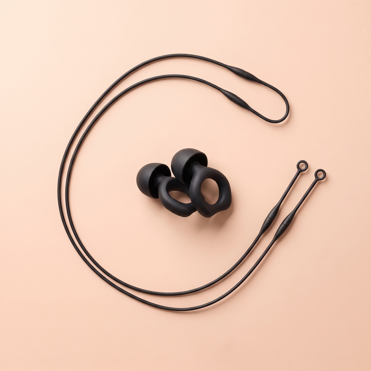Black silicone earplugs with a black magnetic lanyard
