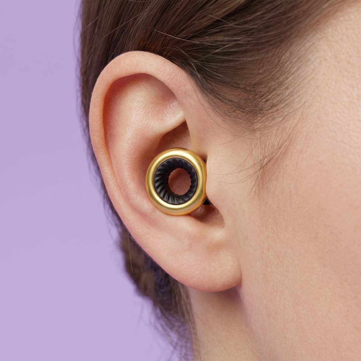 Ring Earplugs in Gold Black, worn in ear v2
