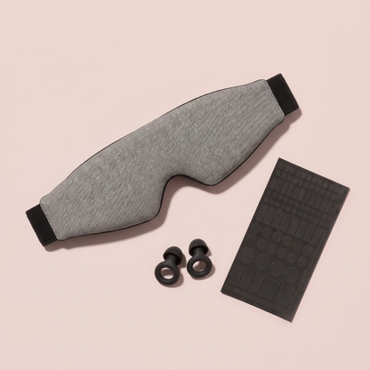 Day Sleep Kit, flat lay: mask, earplugs, stickers