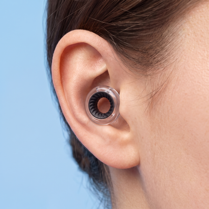 Ring Earplugs in Clear Black, worn in ear