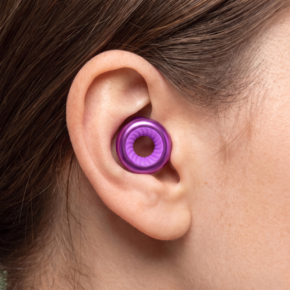 Ring Earplugs in Purple, worn in ear