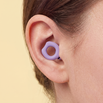 Silicone Earplugs in Purple, worn in ear
