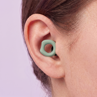 Silicone Earplugs in Green, worn in ear