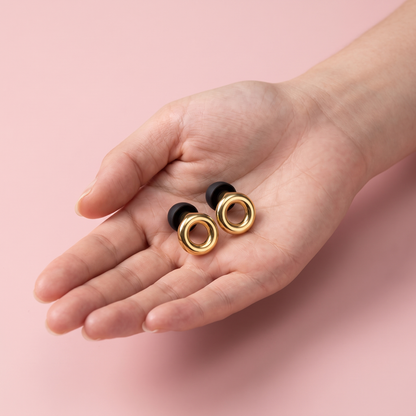 Metal Edition Earplugs in Gold, in hand